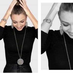 woman showing a variety of jewellery pieces