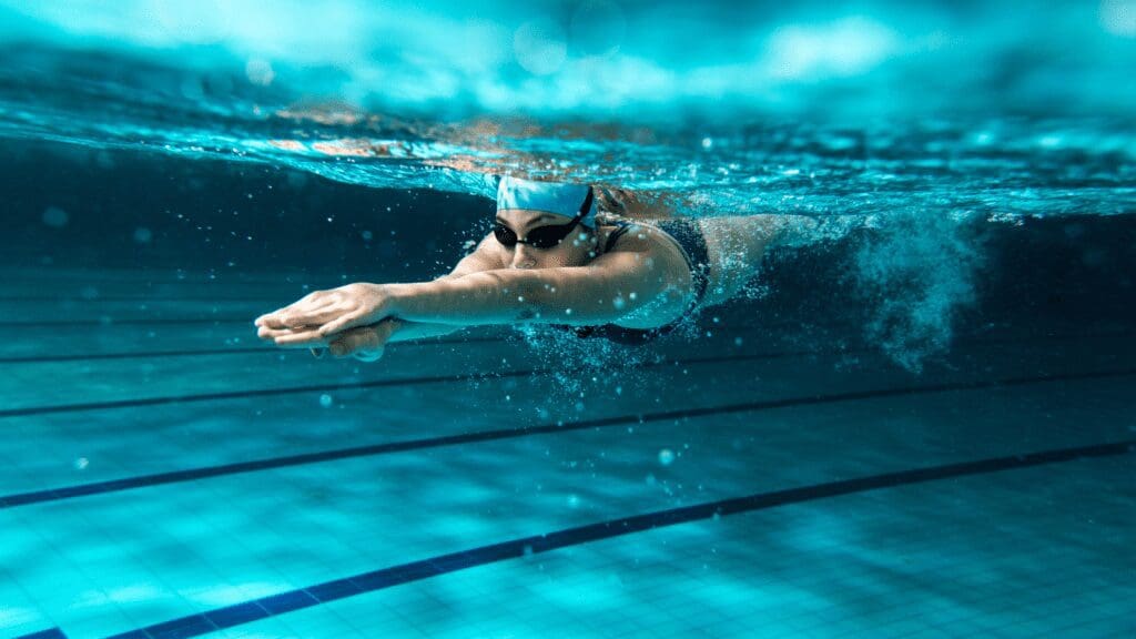 someone swimming in pool