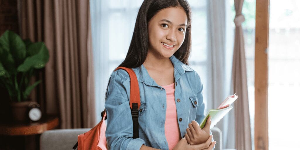 teen coming home from school