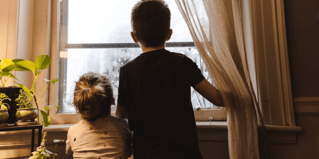 children looking out of window