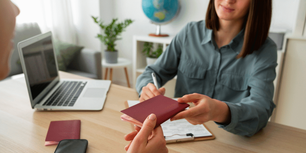 woman handing a visa